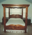 Custom-built pine canopy top bed with raised panel headboard and footboard.