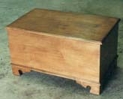 Hand-built birch blanket chest with clear lacquer finish.