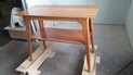 Beautiful cherry table for entry way or office with sleek design.