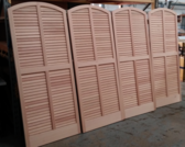 Four exterior shutters ready for paint, all alike and same as sample provided by the client.