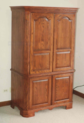 Oak highboy chest serving plenty of storage.