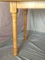 Close-up picture of custom turned leg for table