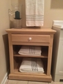 Oak towel caddy built specially for the spot shown.